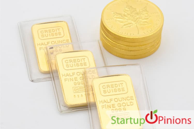 Gold coin and brick